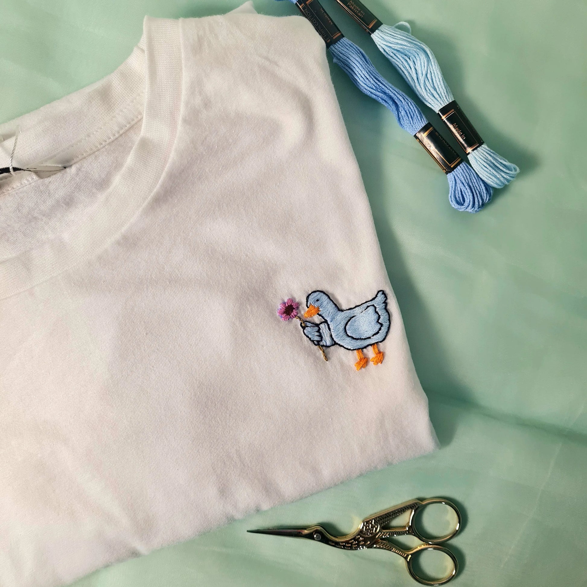 T- shirts - Cute Duck Holding a Flower