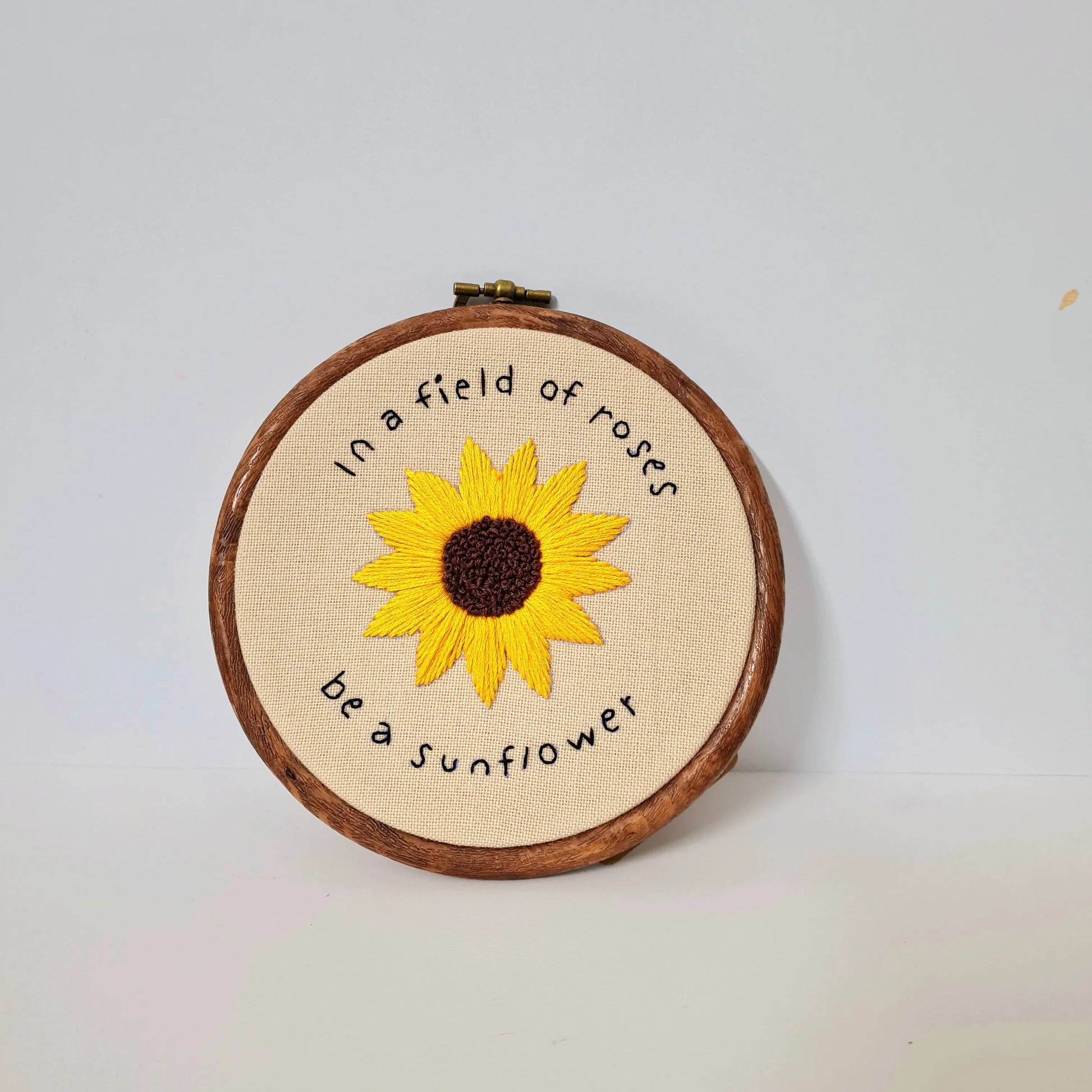 Sunflower Among Roses