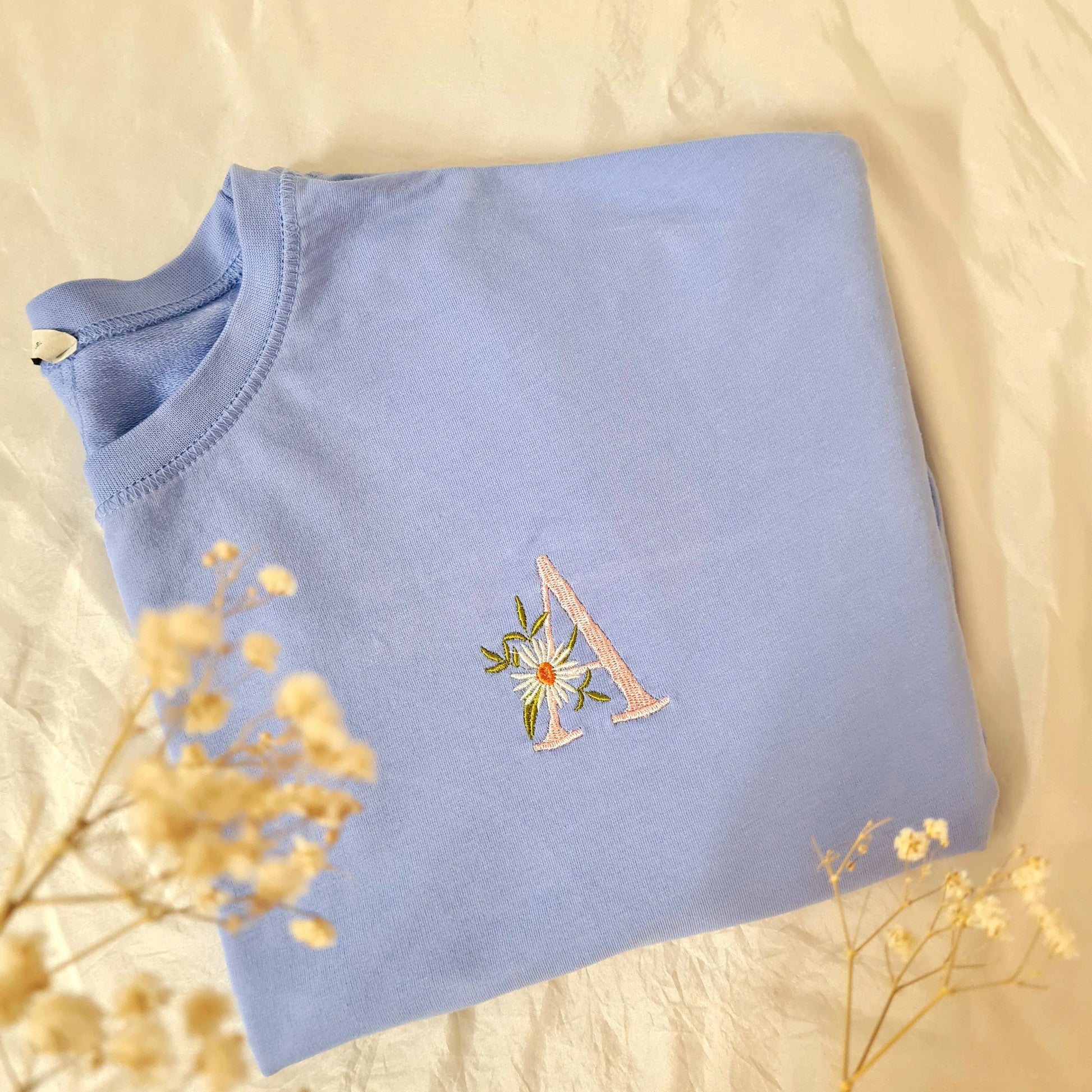 T- shirts - Letters with flowers adorned