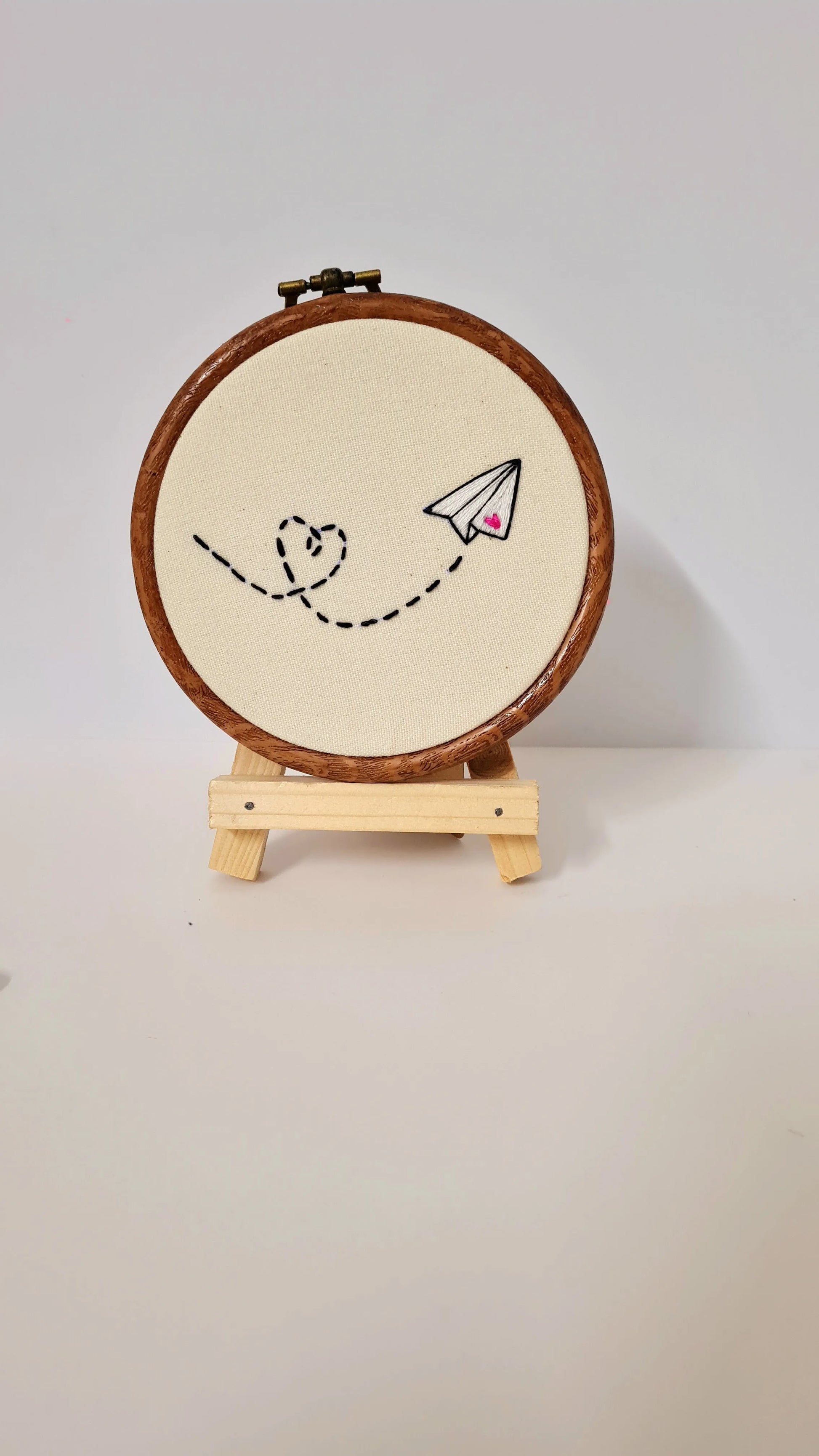 Paper airplane making a heart