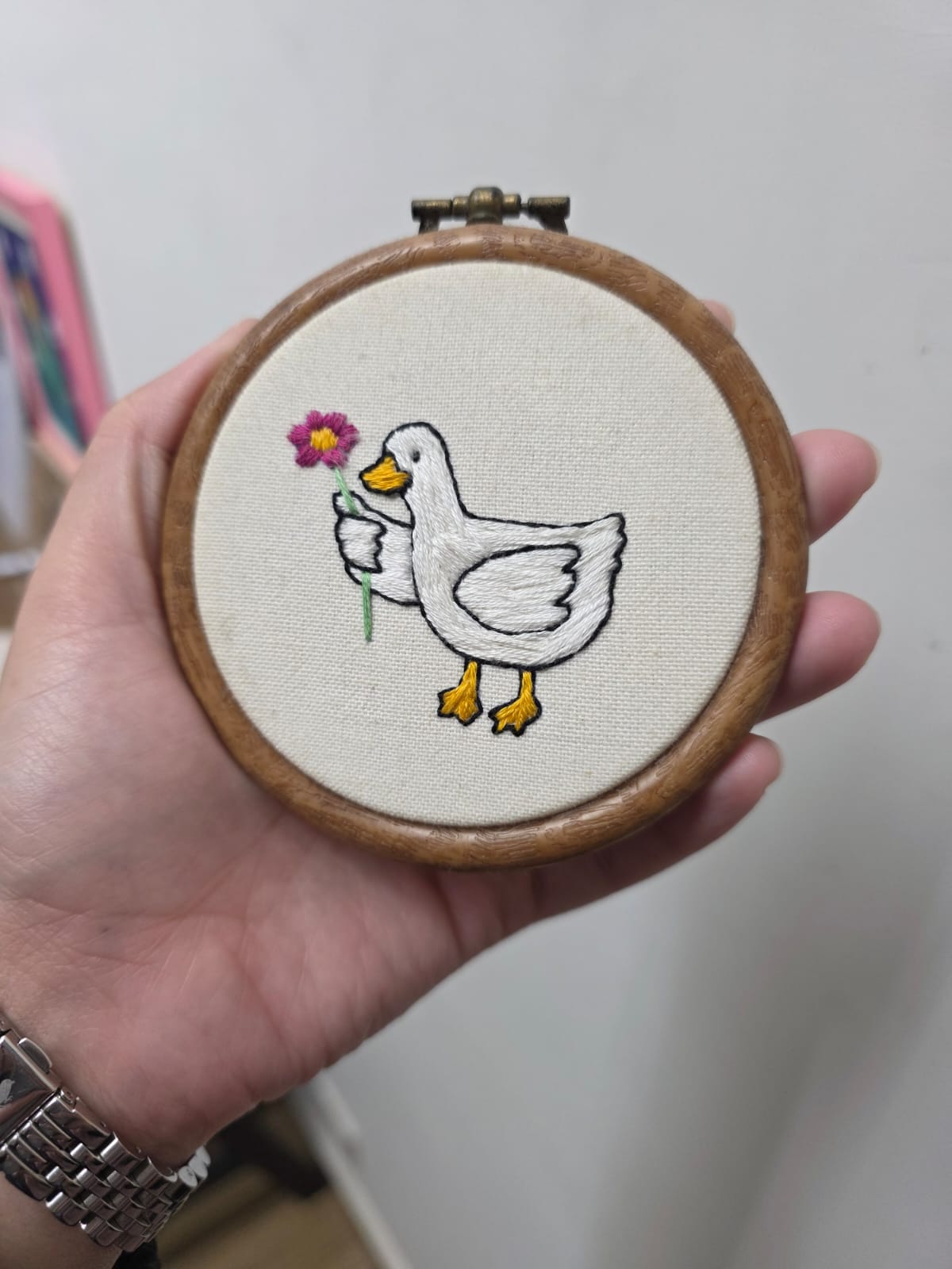 Duck offering a flower